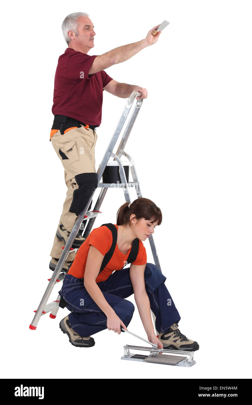 Arbeiter und sein Lehrling. Stockfoto