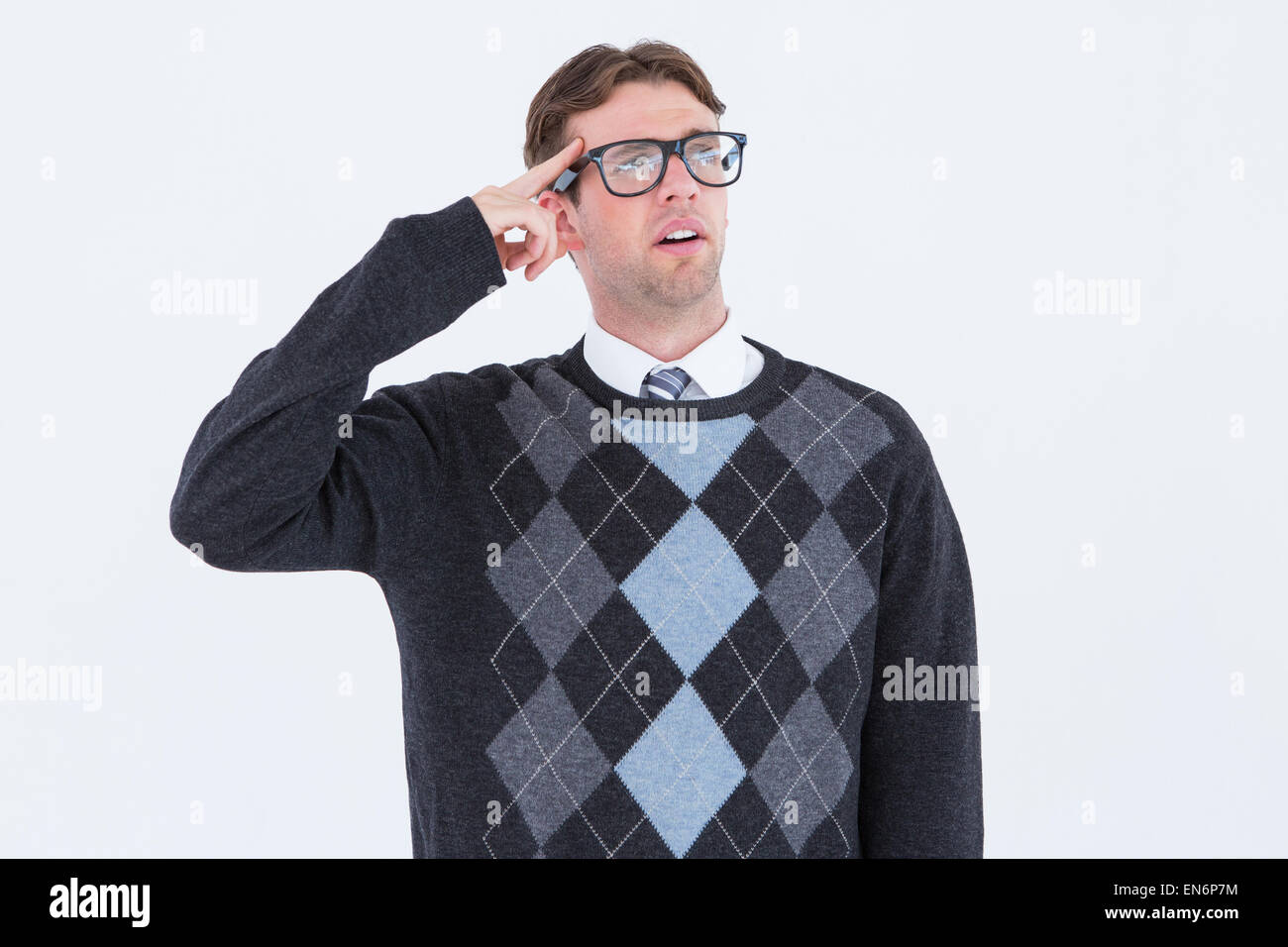 Geeky Hipster mit Finger auf Tempel denken Stockfoto