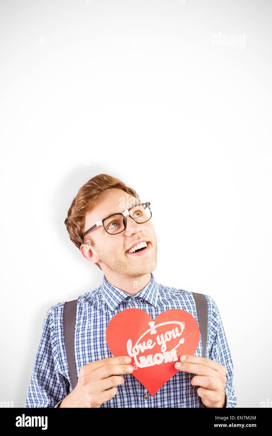 Zusammengesetztes Bild geeky Hipster hielt eine Herzkarte Stockfoto