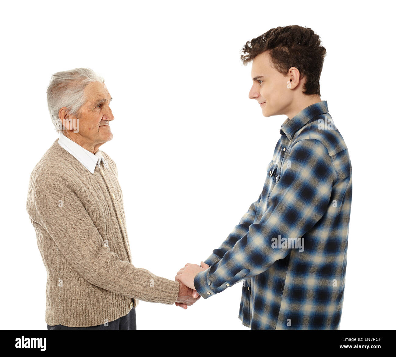 Handshake zwischen Großvater und Enkel, die isoliert auf weißem Hintergrund Stockfoto