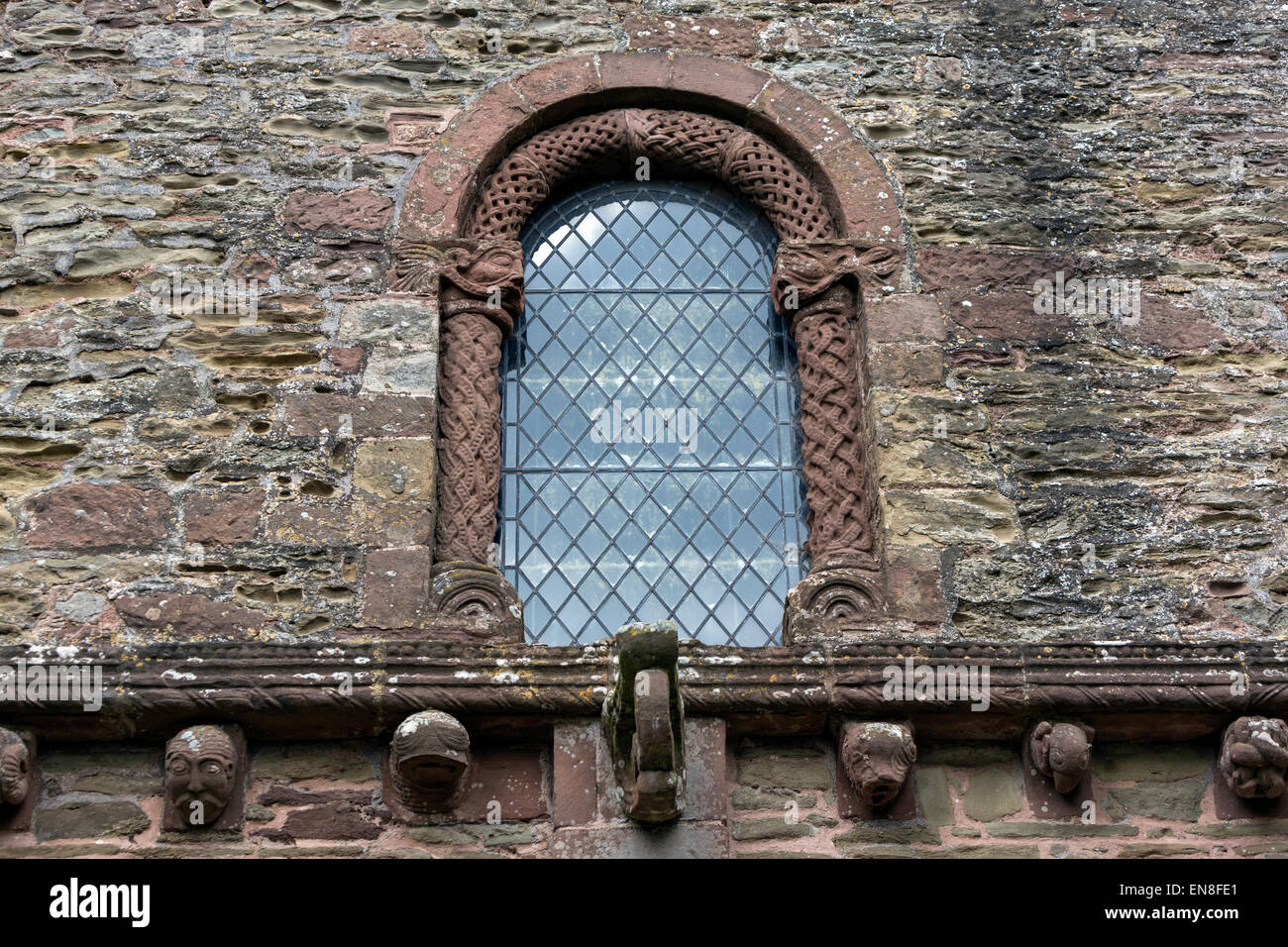 Das Westfenster der Kirche von St. Maria und St. David, Kilpeck, Hereford, England, Vereinigtes Königreich Stockfoto