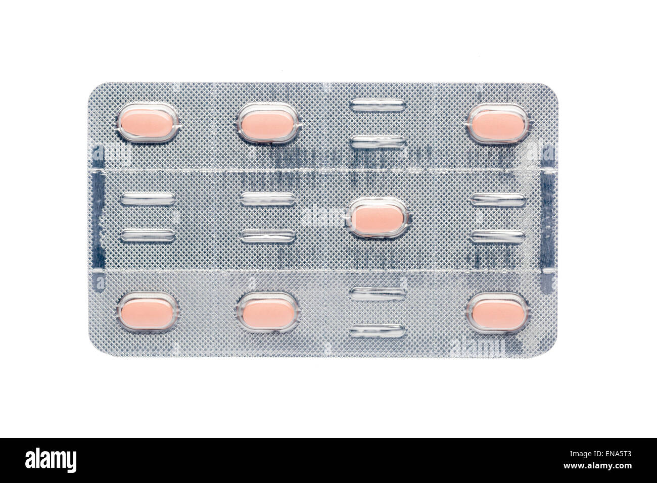 Die pastellfarbenen Pillen in einem Blister auf weißem Hintergrund Stockfoto