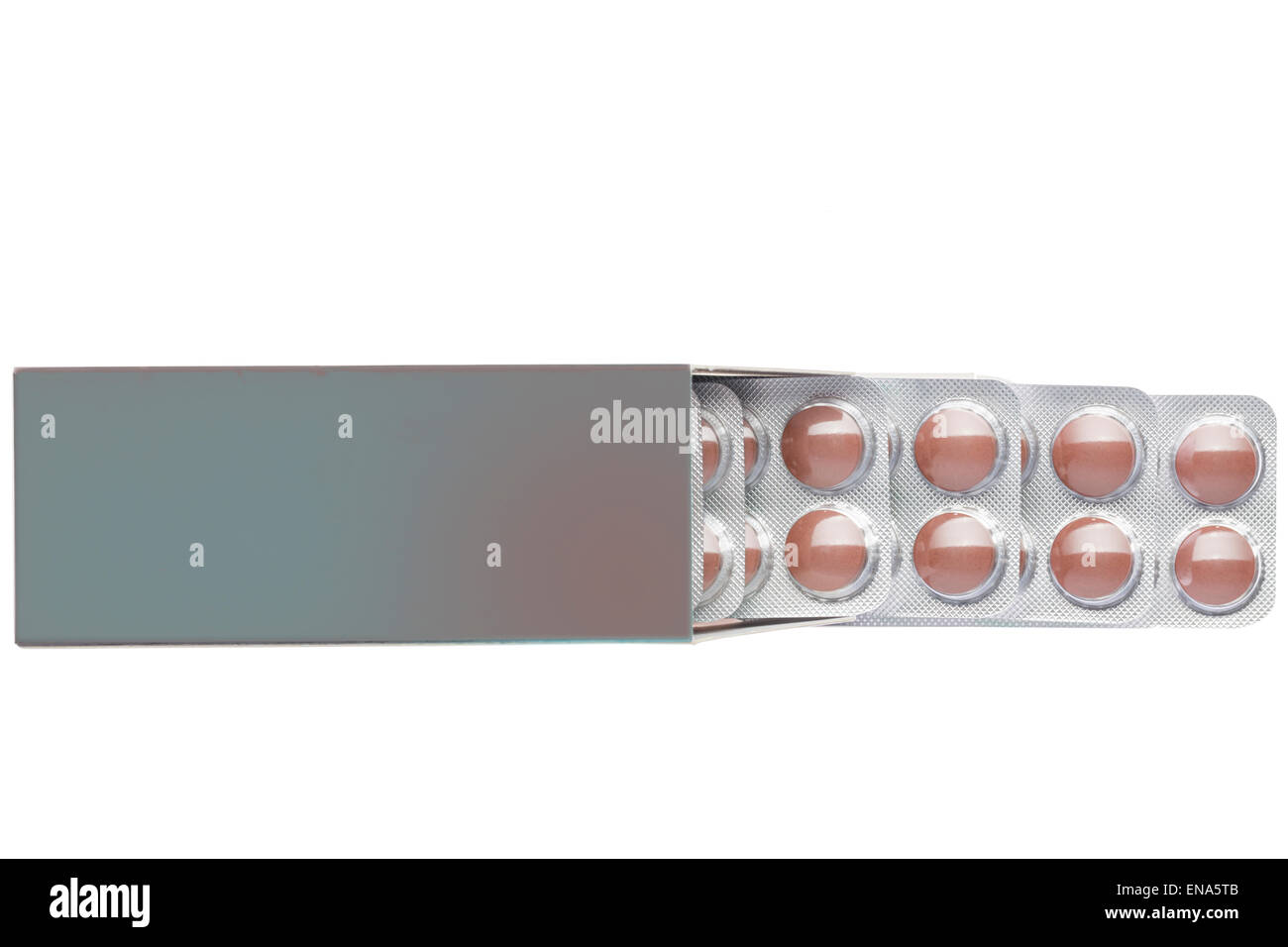 Dunklen Kasten mit braunen Pillen in einem Blister Pack auf einem isolierten Hintergrund Stockfoto