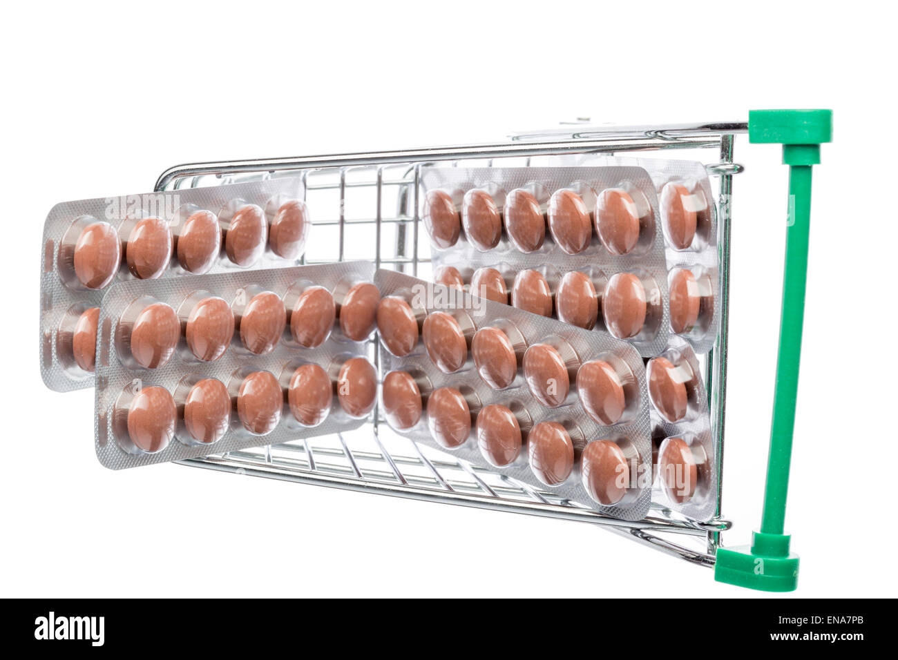 Warenkorb mit braunen Pillen Blister auf einem weißen Hintergrund Stockfoto