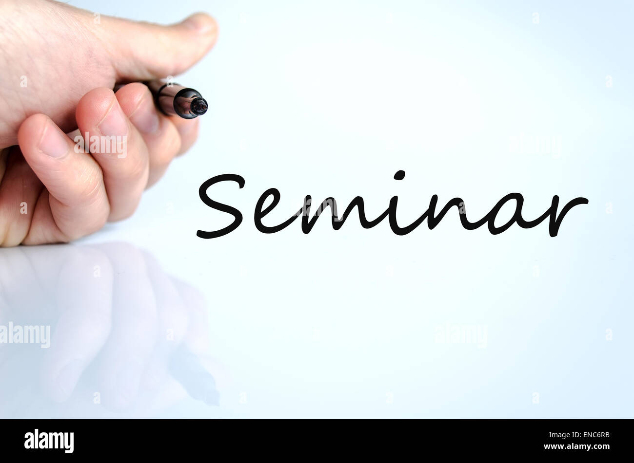 Stift in der Hand isoliert auf weißem Hintergrund-Seminar-Konzept Stockfoto