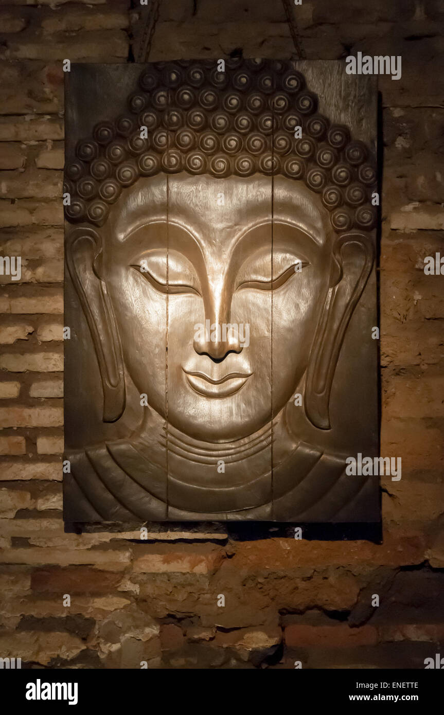 Budda Gesicht Ziegel Hintergrund Stockfoto
