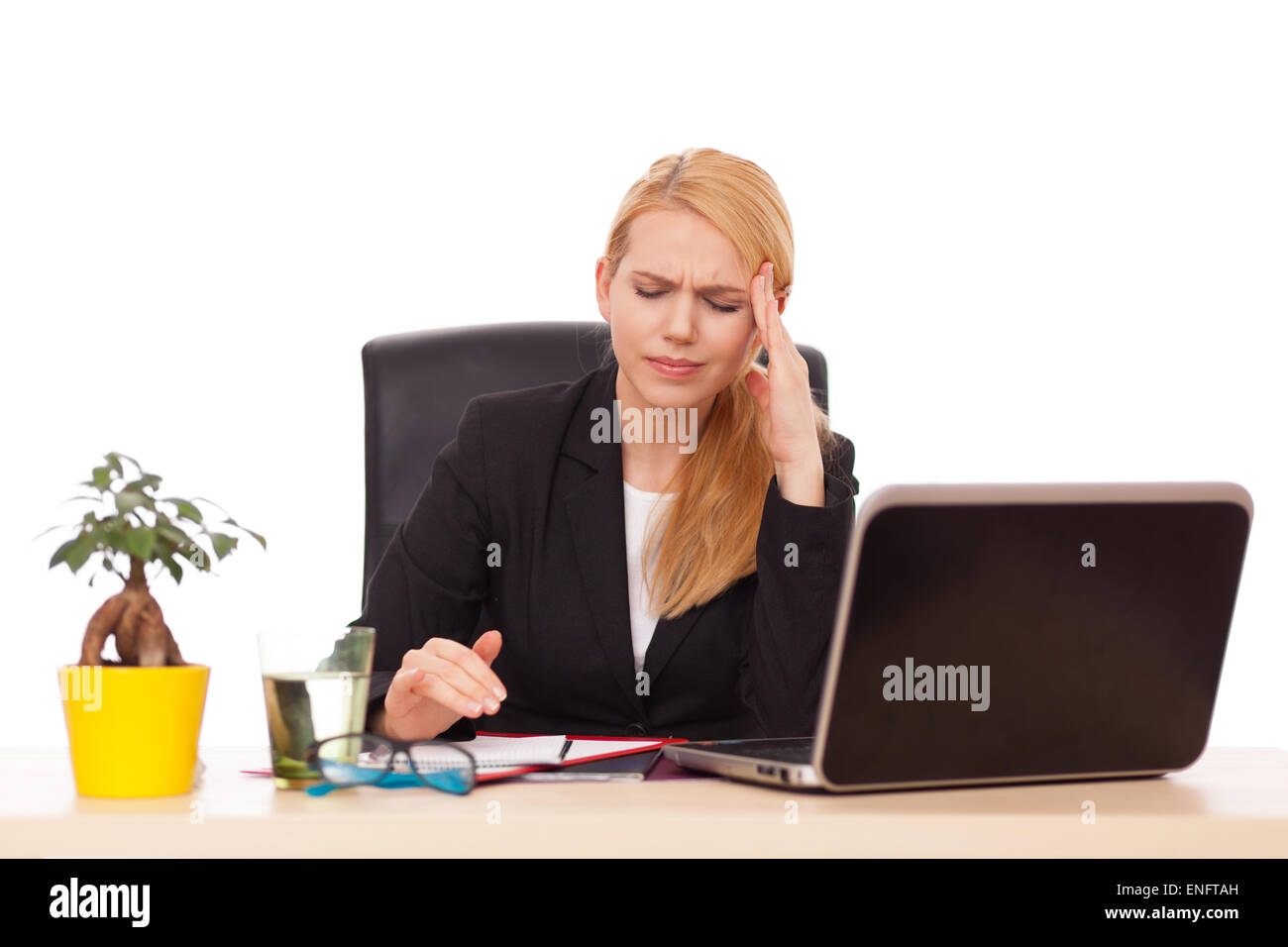 Junge Geschäftsfrau in ihrem Büro Stockfoto