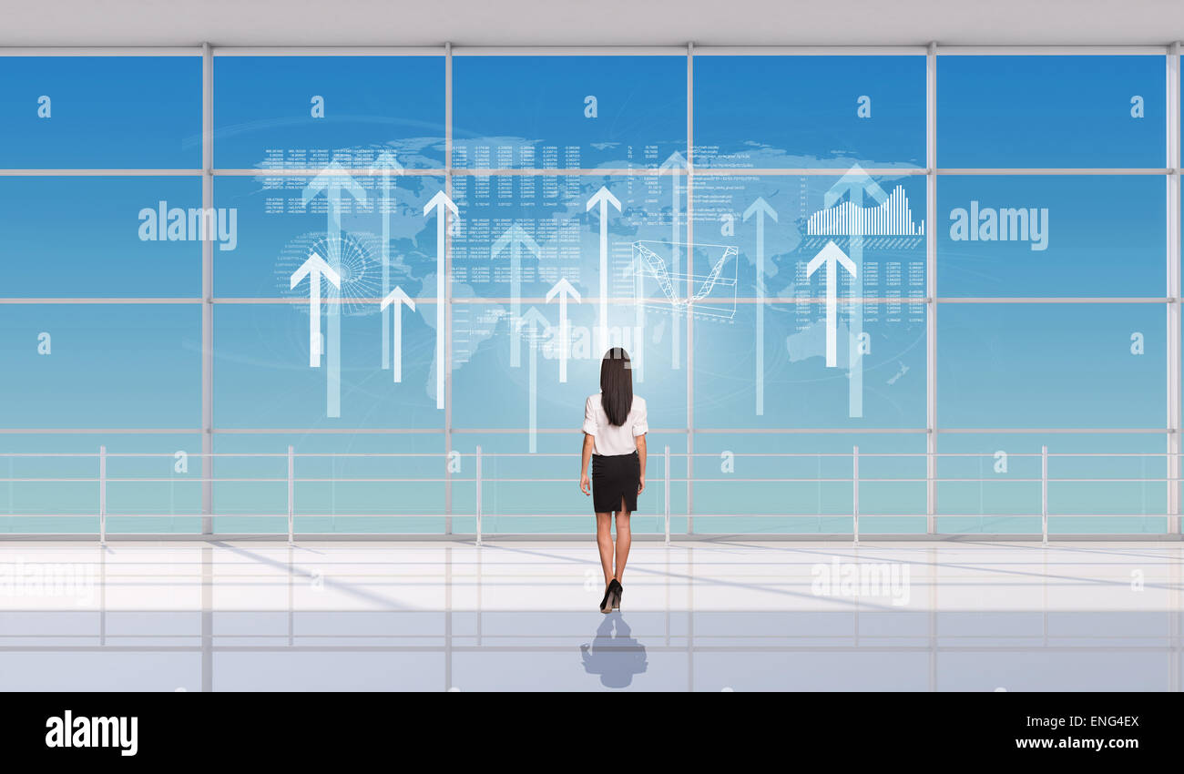 Junge Geschäftsfrau stehend zurück Stockfoto