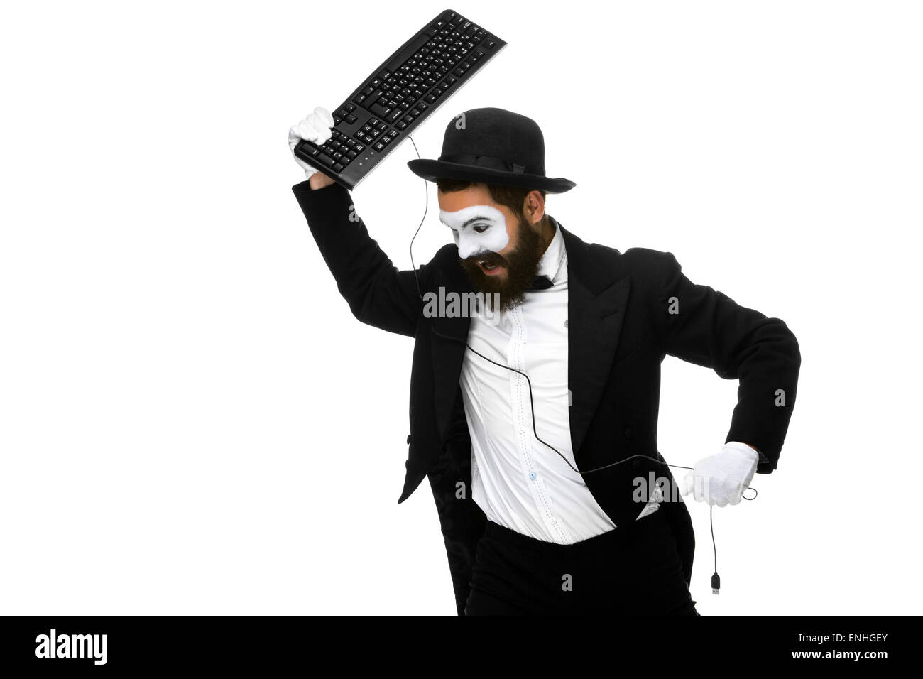 Wütend Mime als Geschäftsmann ist Tastatur zerstören Stockfotografie - Alamy