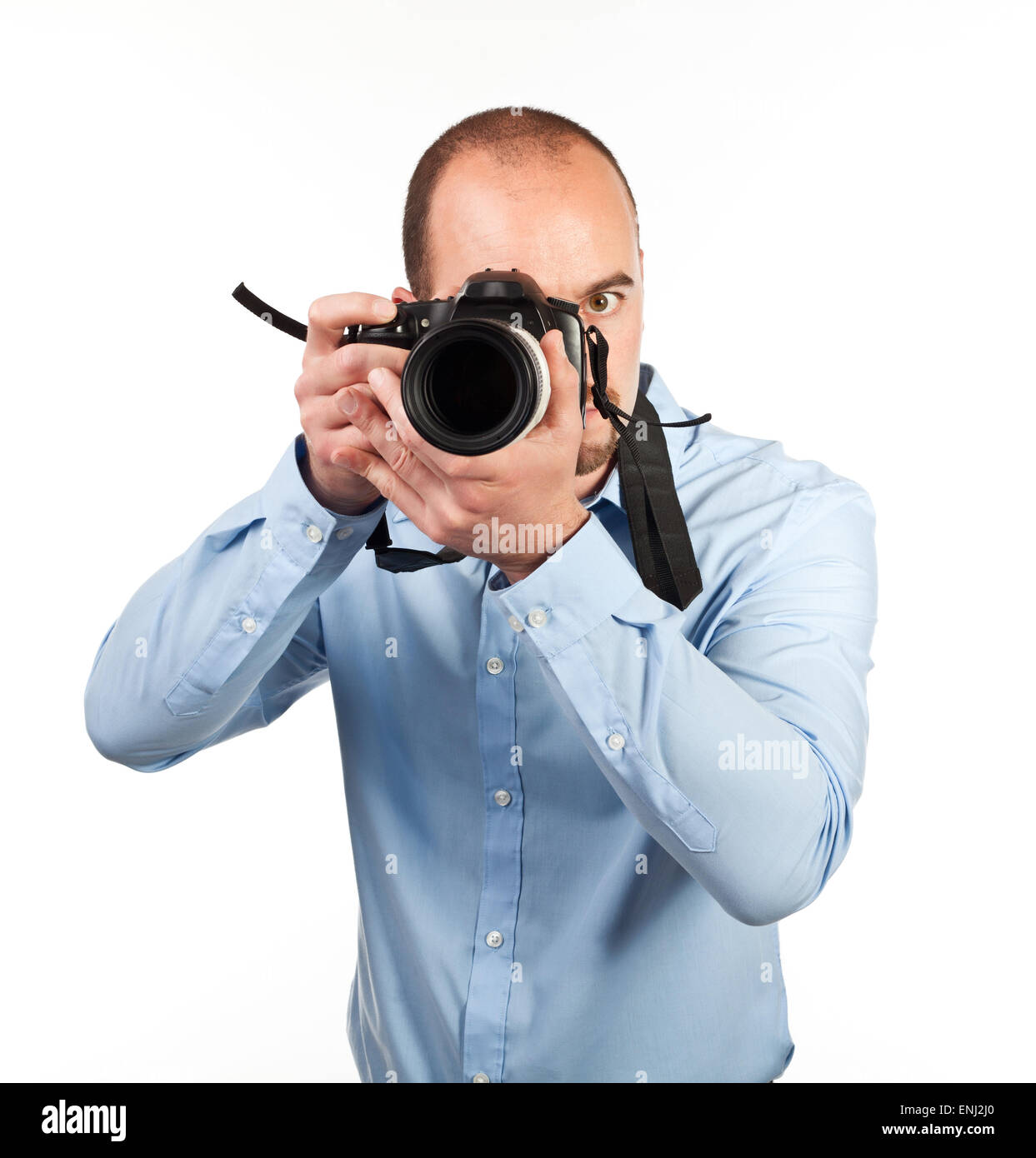 Fotograf in Aktion isoliert auf weiss Stockfoto