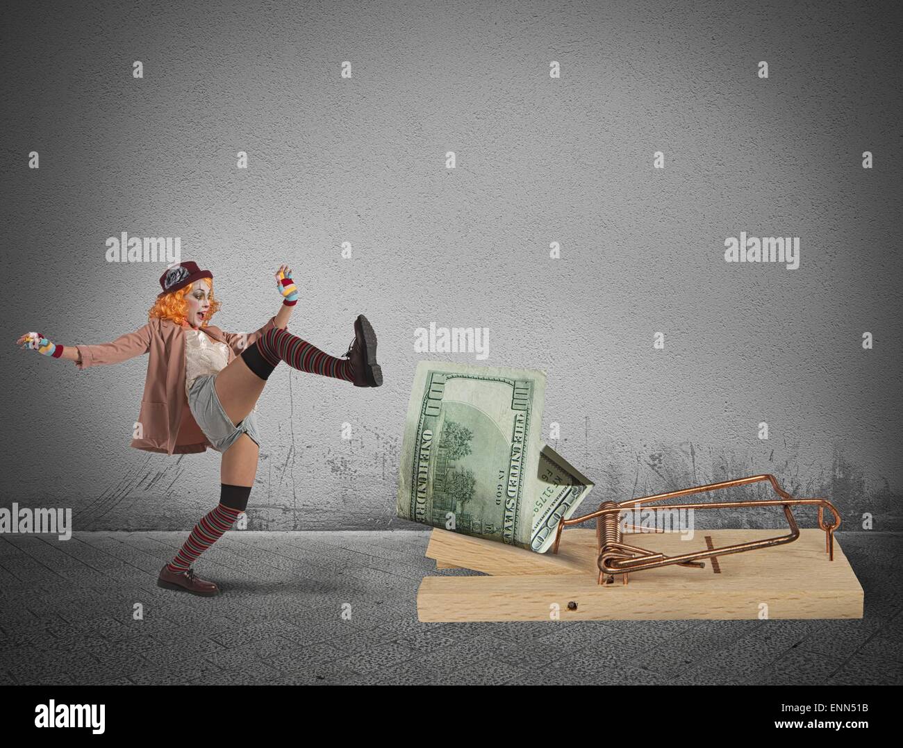 Clown-Geld-Falle Stockfoto