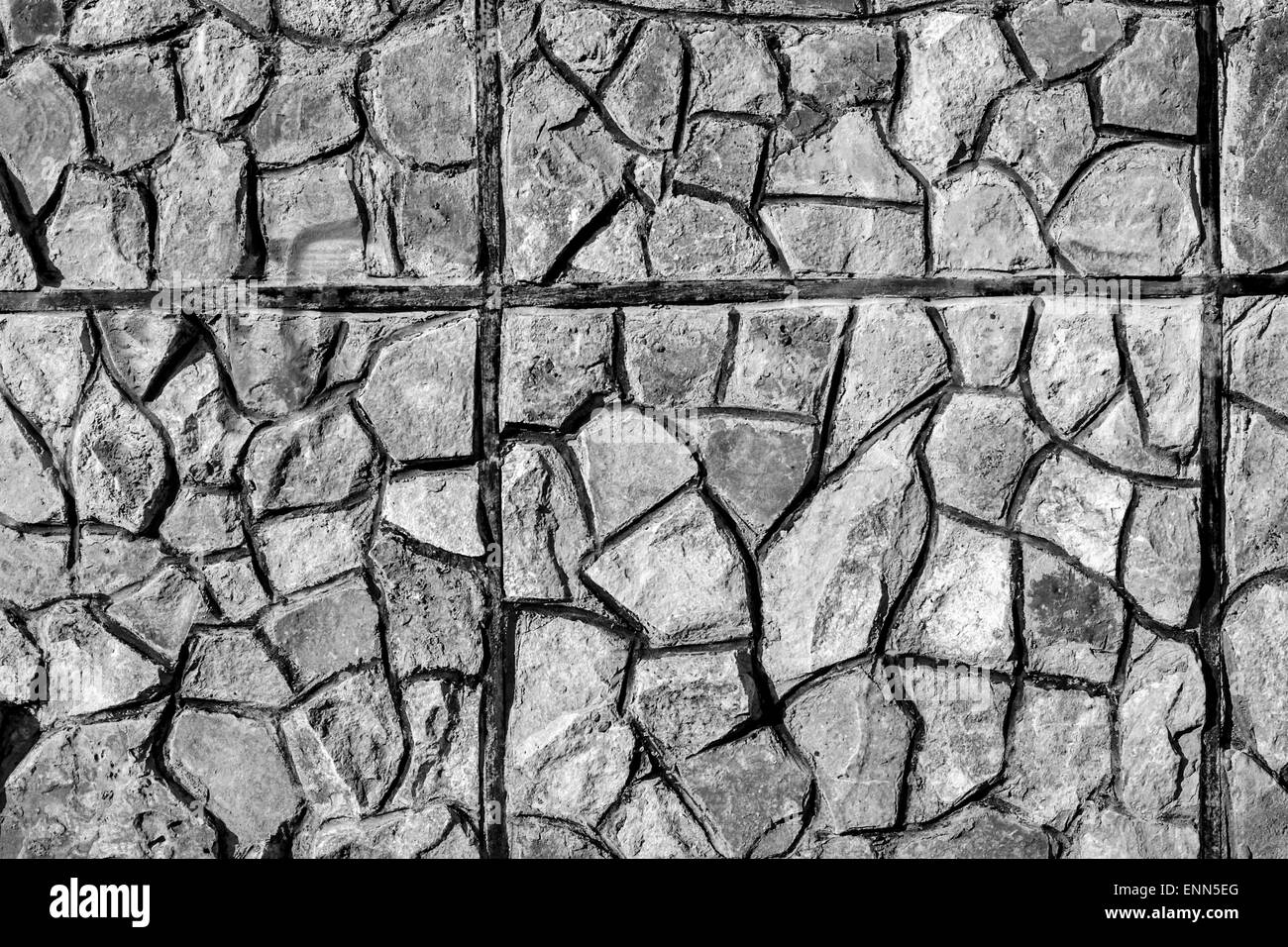 Zement-Felsen schlossen sich zusammen zu einer gut ausgebauten Stadtmauer Stockfoto