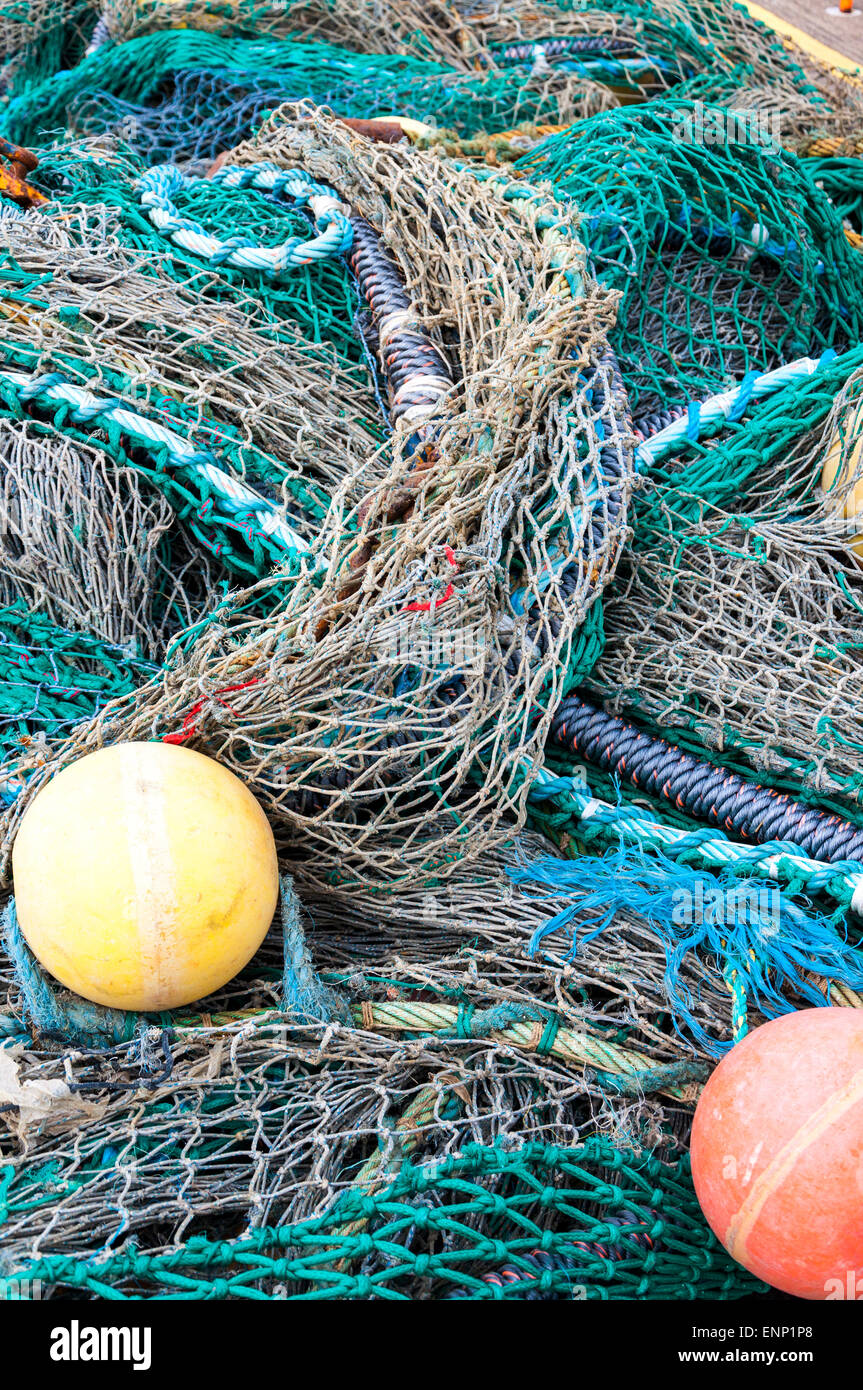 Dockside Fischernetze und Bojen Stockfoto