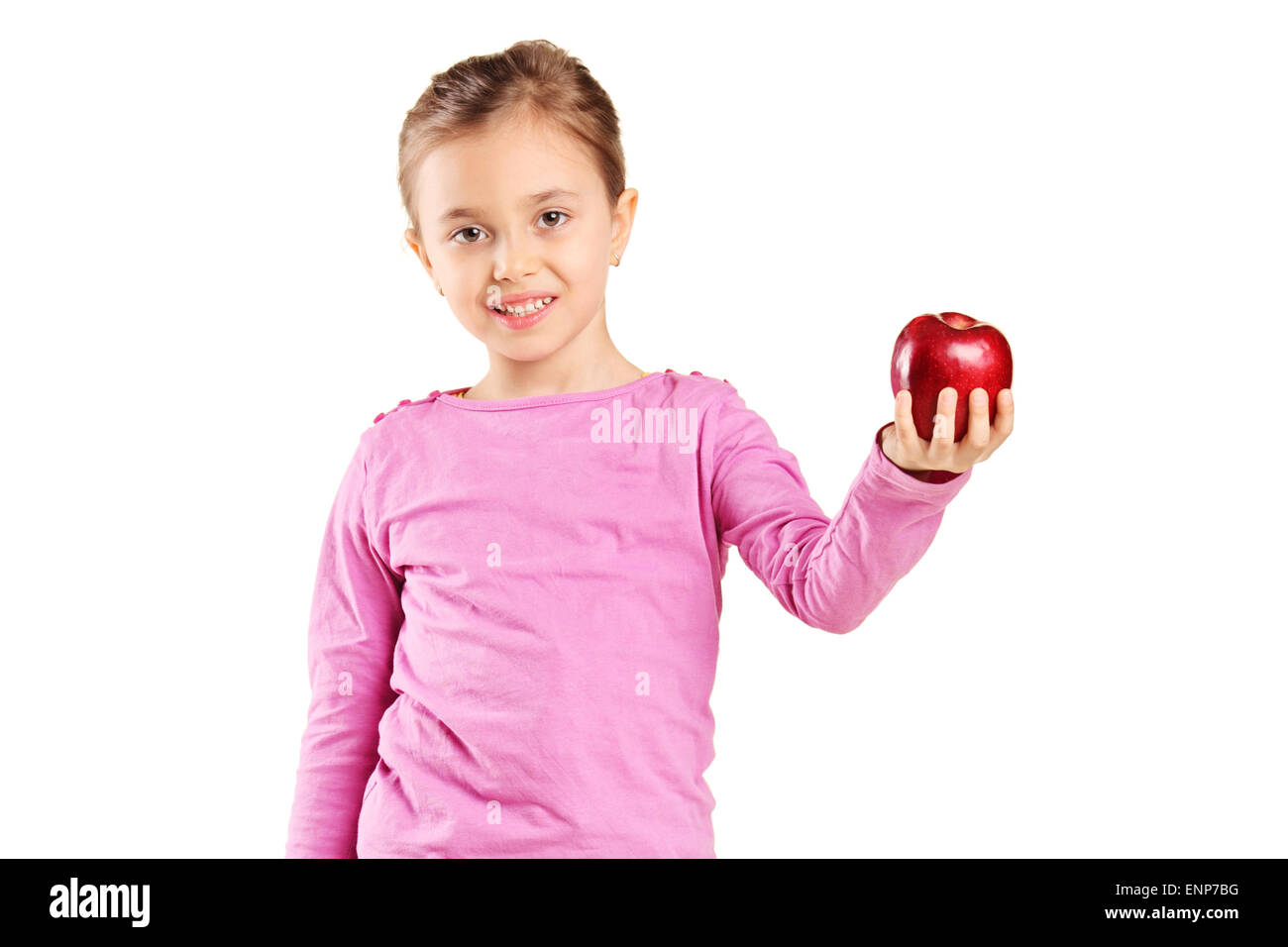 Niedliche kleine Mädchen hält einen Apfel isoliert auf weißem Hintergrund Stockfoto