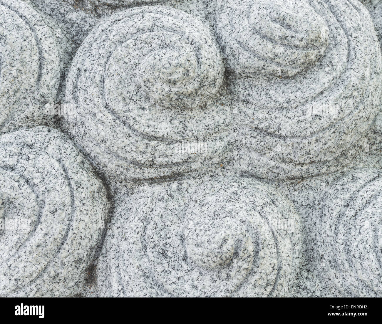 Chinesen geschnitzt grauen Stein mit runden Schnecke Muster Stockfoto