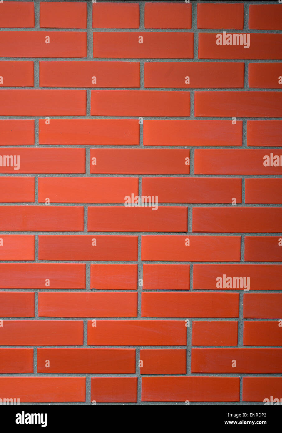 Rote Ziegel Wand Hintergrund. Vertikale Ansicht. Stockfoto