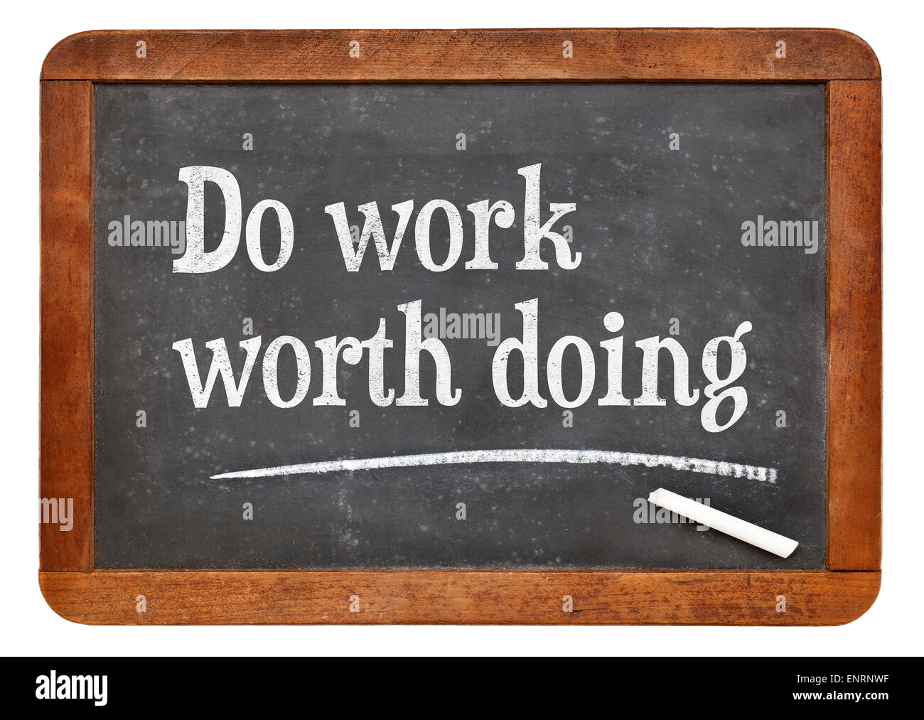 Arbeiten lohnt - motivierende Worte auf einer Vintage Schiefer Tafel Stockfoto