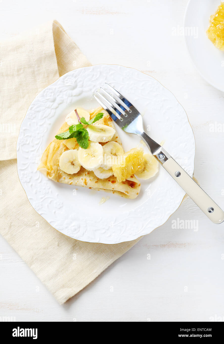 Crepes mit Banane und Waben, Essen Stockfoto