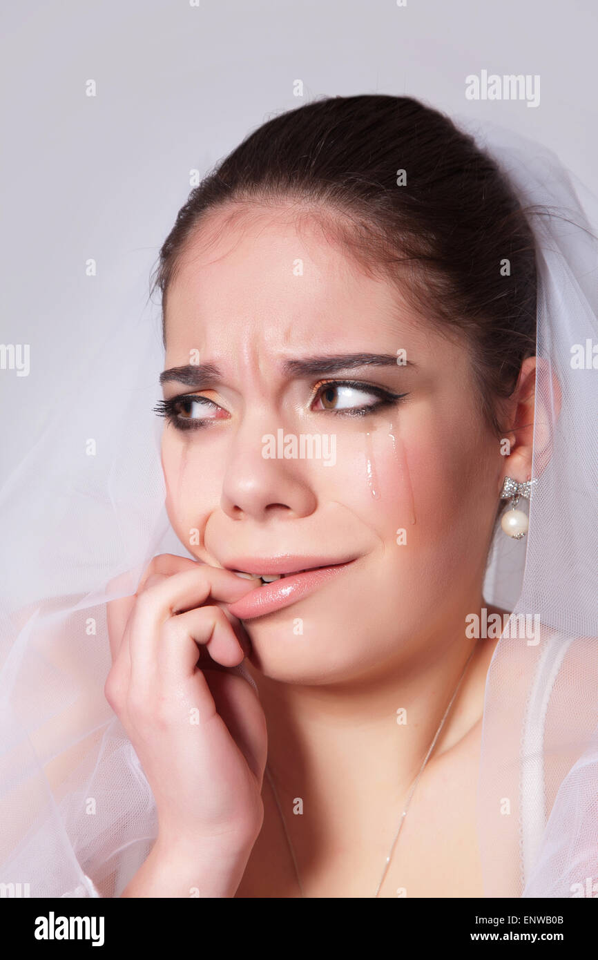 Porträt einer schönen Braut weint verletzt closeup Stockfoto