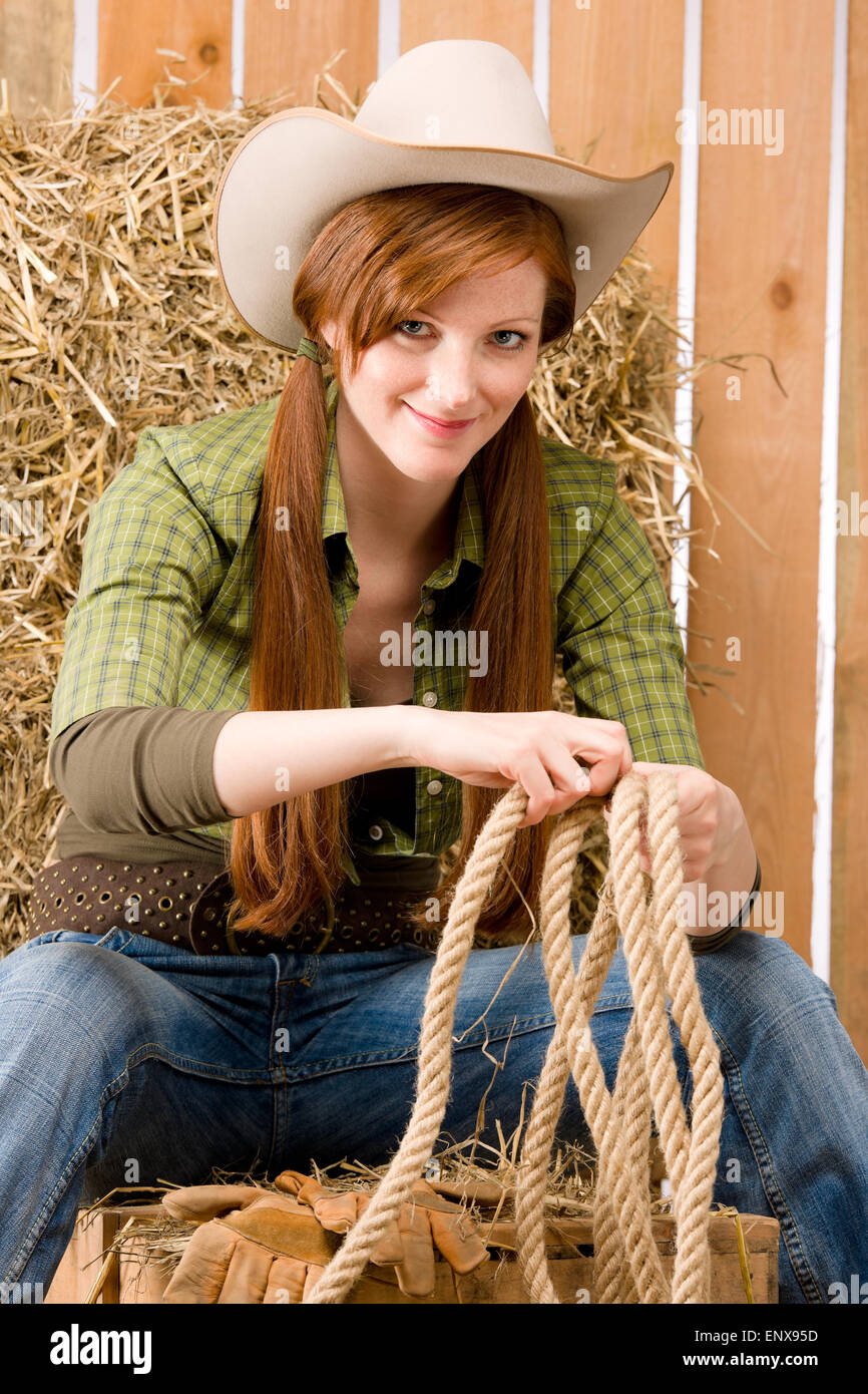 Junge Cowgirl western Country-Stil mit Seil Stockfoto