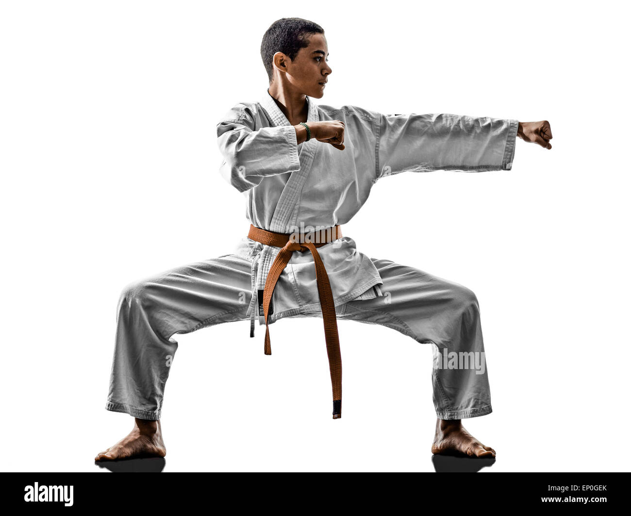 ein Karate Kata Training Jugendliche Kind isoliert auf weißem Hintergrund Stockfoto