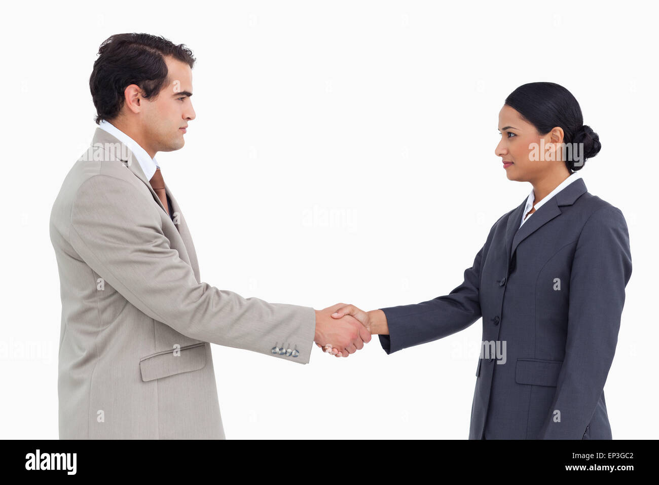 Seitenansicht des ernstes Geschäft Partner Hände schütteln Stockfoto