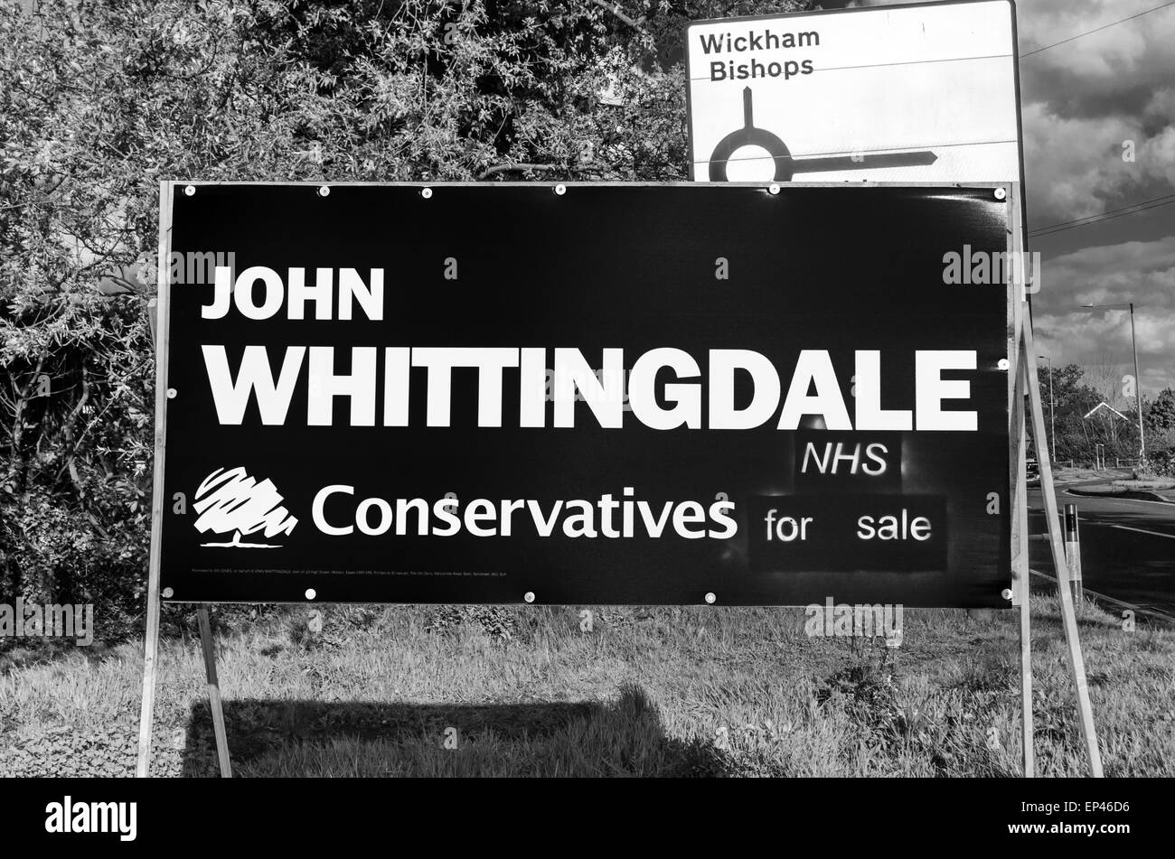 Werbung Zeichen für John Whittingdale konservativen Kandidaten für Maldon angegriffen mit speichern NHS graffiti Stockfoto