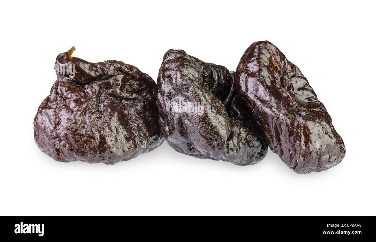 Getrocknete Entsteinte Pflaumen isoliert auf weißem Hintergrund Stockfoto
