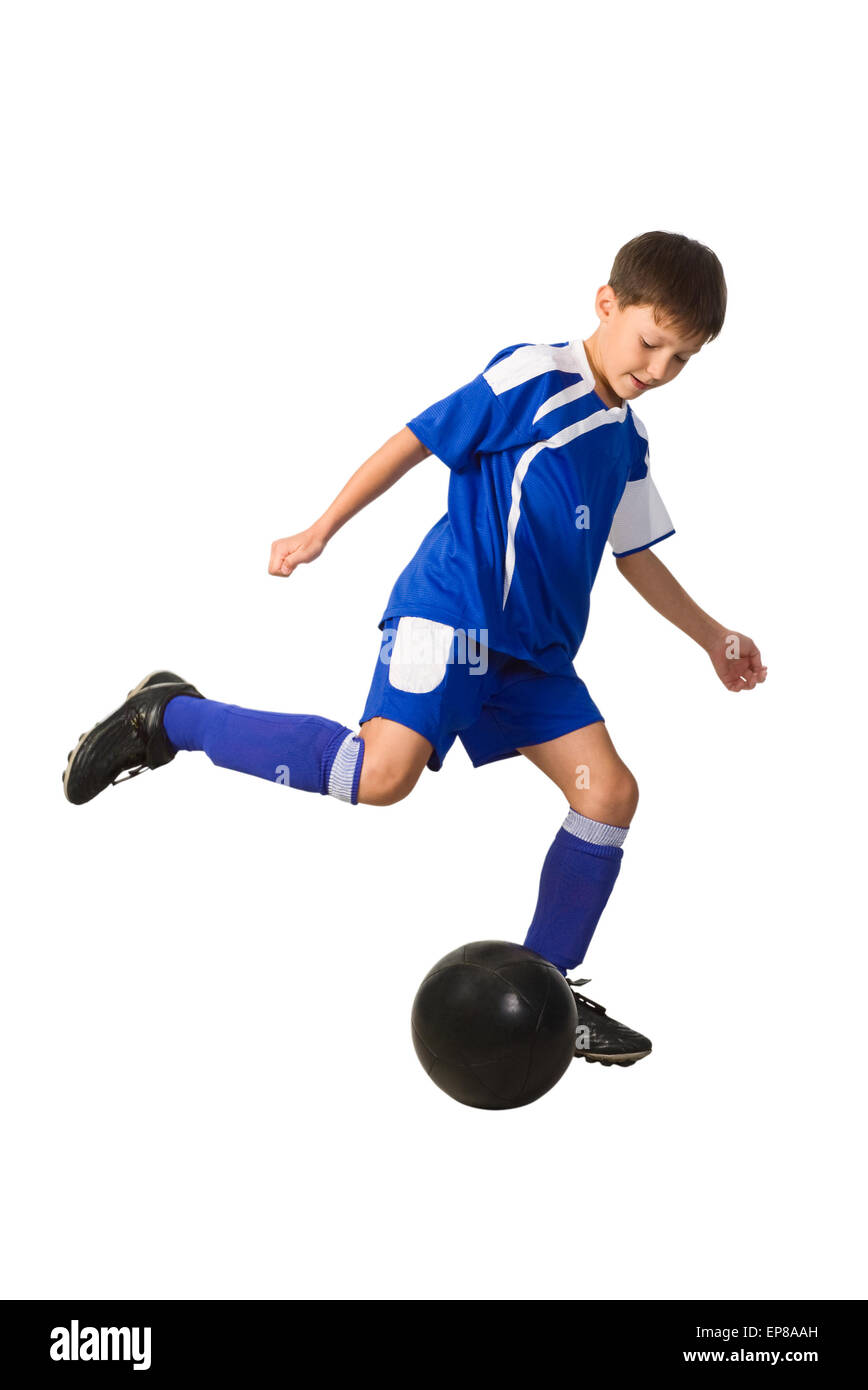 Ein kleiner junge Fußballspieler in blaue uniform isoliert auf weiss Stockfoto
