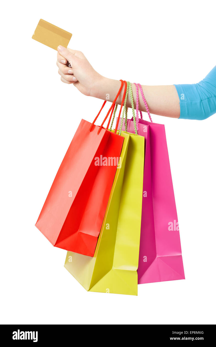 Frau Hand mit Einkaufstüten und Kreditkarte auf weiß Stockfoto