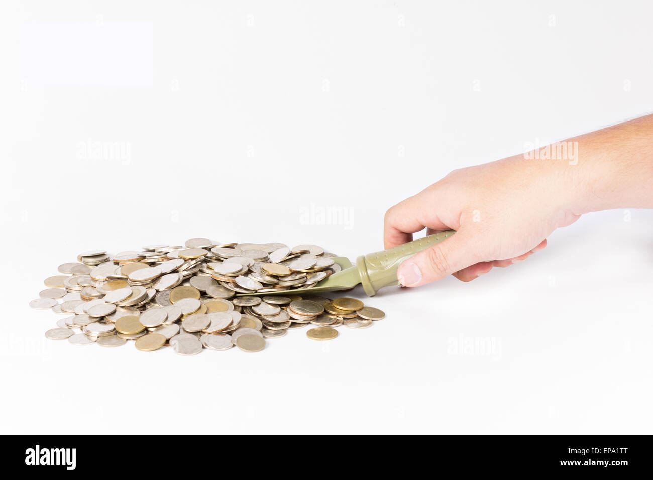 Hand halten Kelle Schaufel Geld Münze Stockfoto