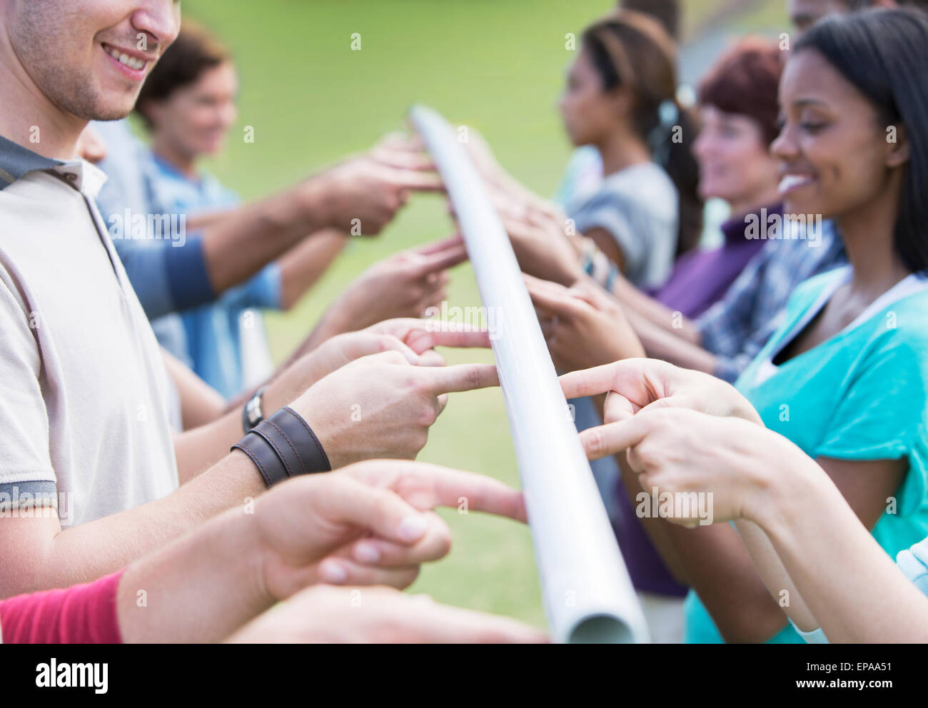 Team ausgleichenden Pol Fingerspitze Stockfoto