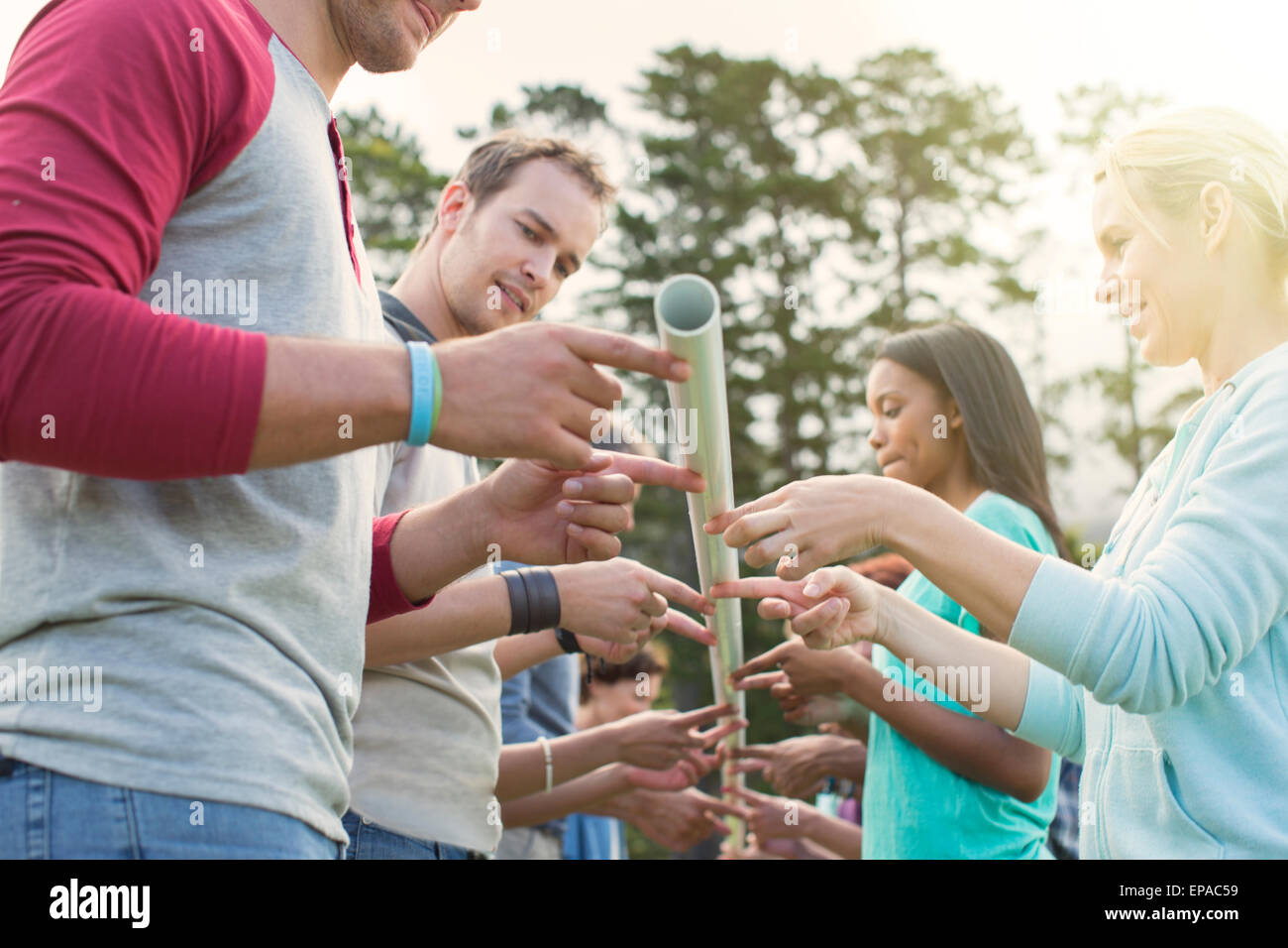 Team ausgleichenden Pol Fingerspitze Stockfoto