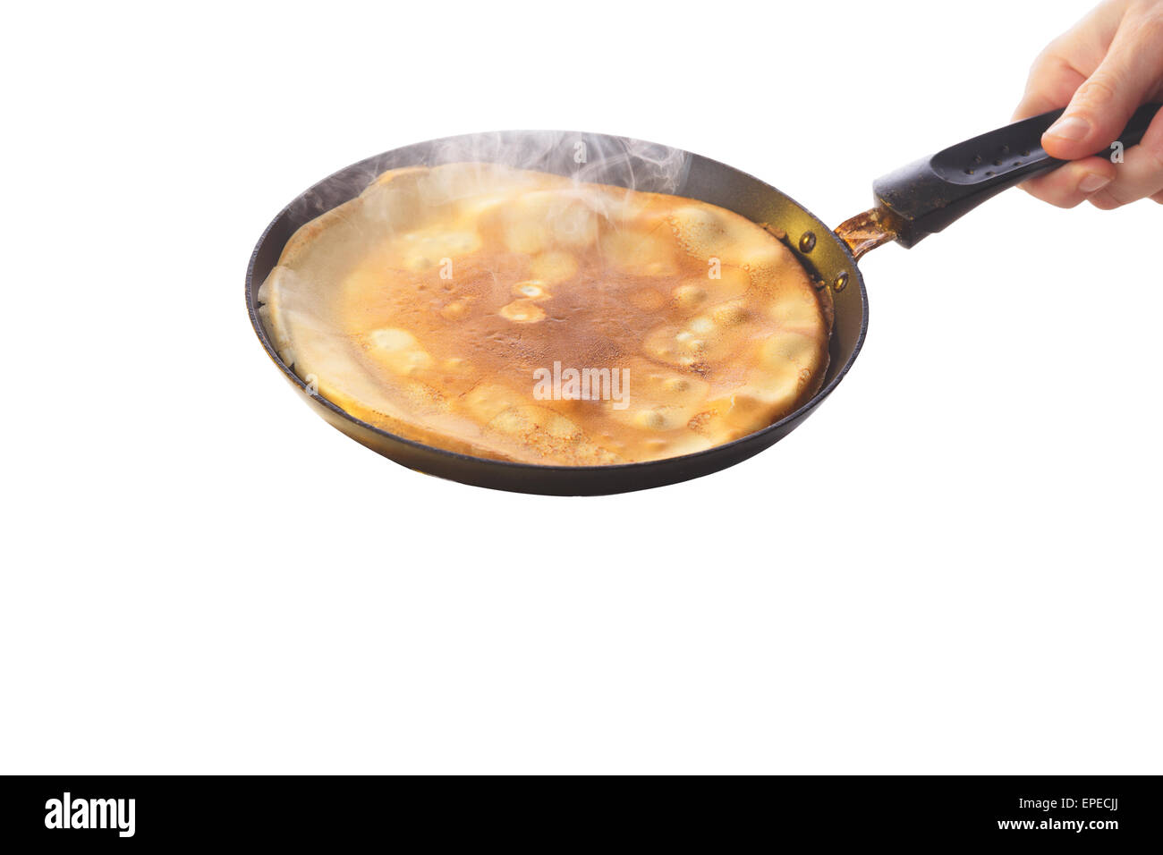 Prozess des Kochens Crêpe in einer Pfanne Stockfoto