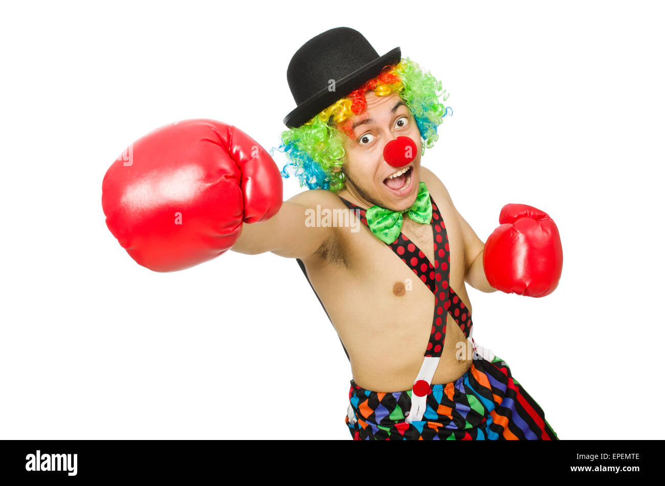 Clown mit Boxhandschuhen isoliert auf dem weißen Stockfoto
