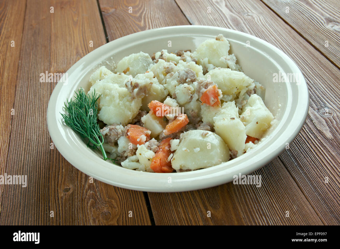 Stovies - schottischen Gericht basierend auf potatoes.contains Kartoffeln mit, verschiedentlich, Zwiebeln, Karotten, anderes Gemüse, Hackfleisch Rind. Stockfoto