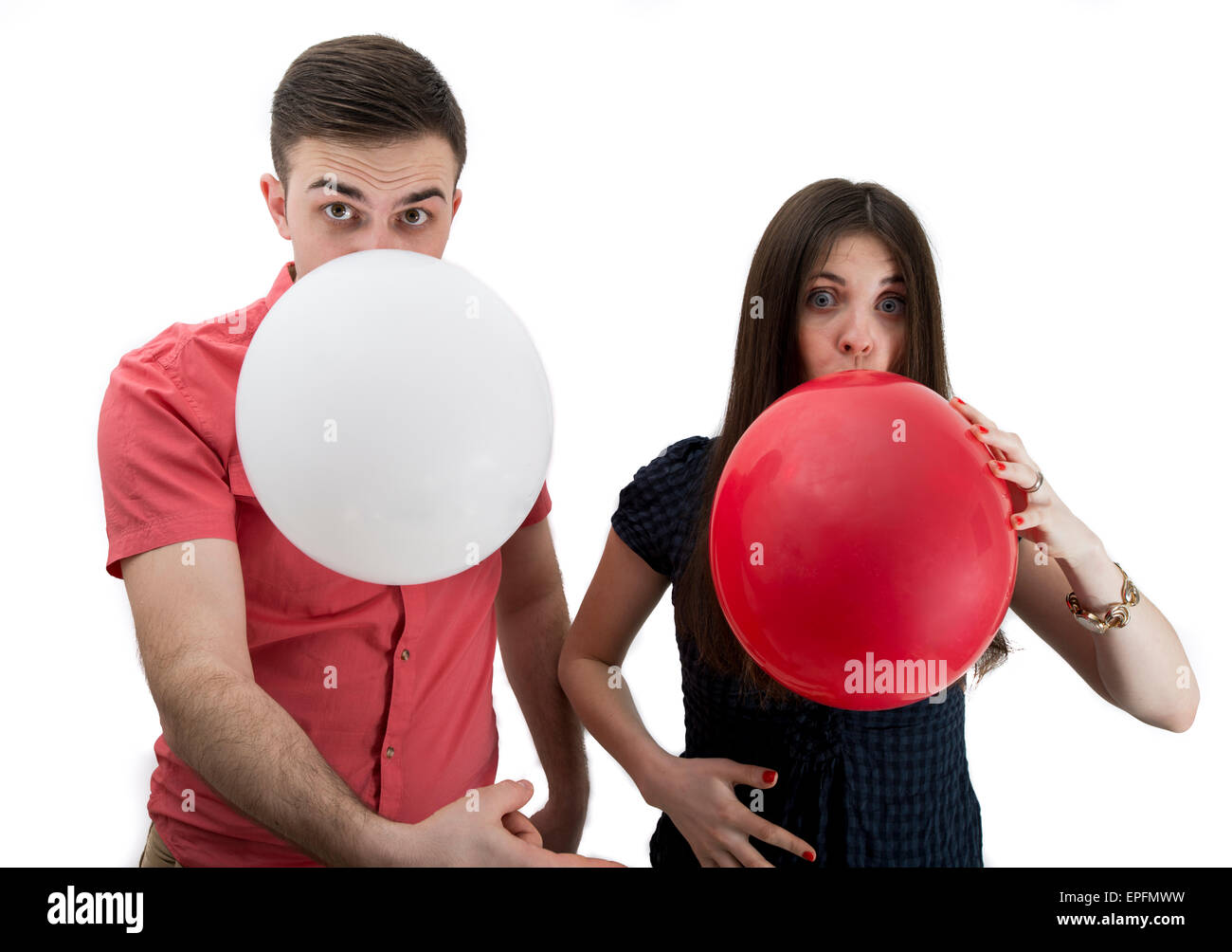 Paar Ankündigung ihres Babys mit ballons Stockfoto