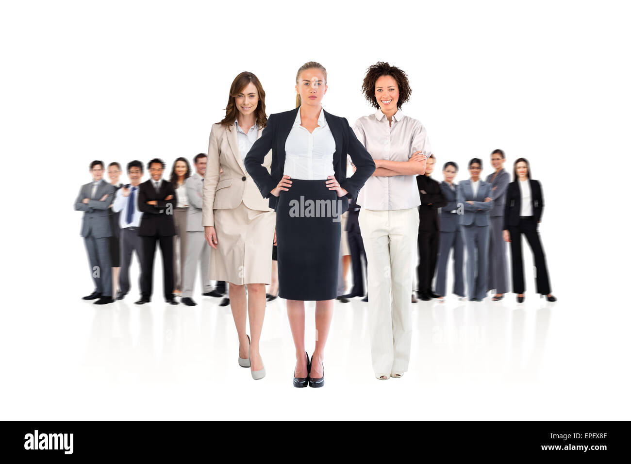 Zusammengesetztes Bild des Teams von Geschäftsfrauen Blick in die Kamera Stockfoto