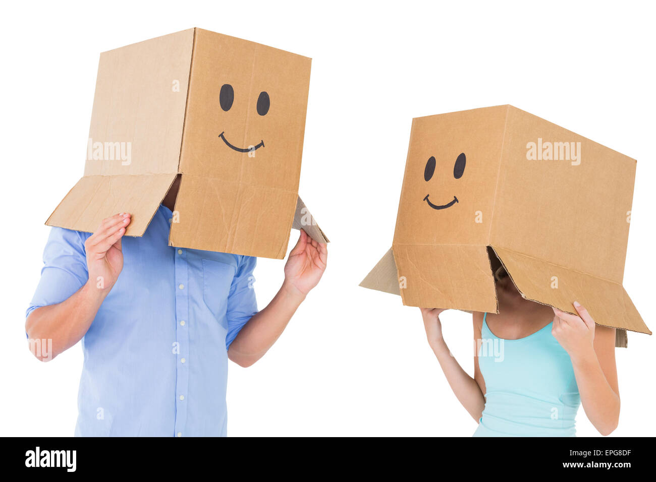 Paar Emoticon Gesichtsfelder auf ihren Köpfen tragen Stockfoto