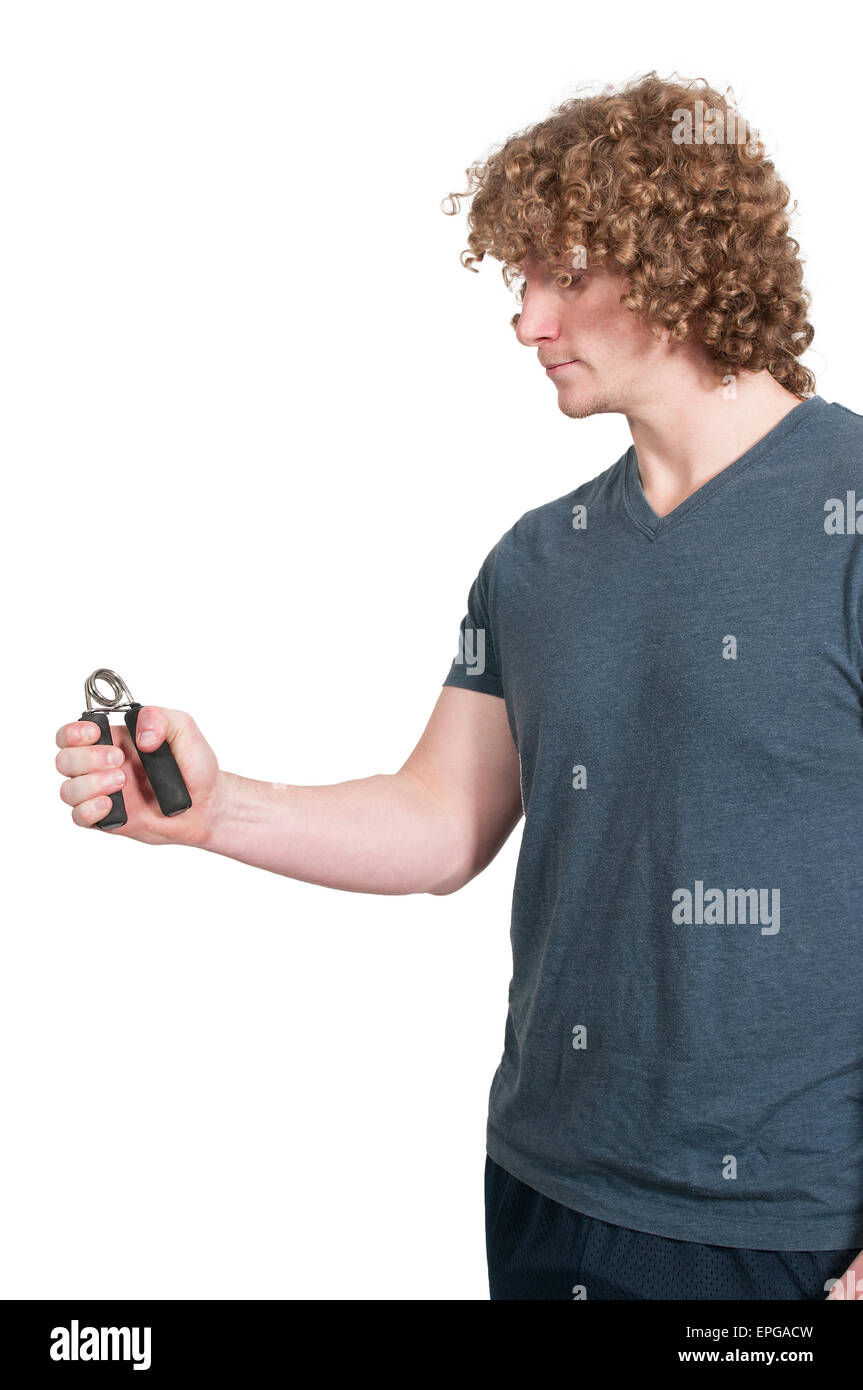 Mann mit Hand-Griff-Trainingsgerät Stockfoto