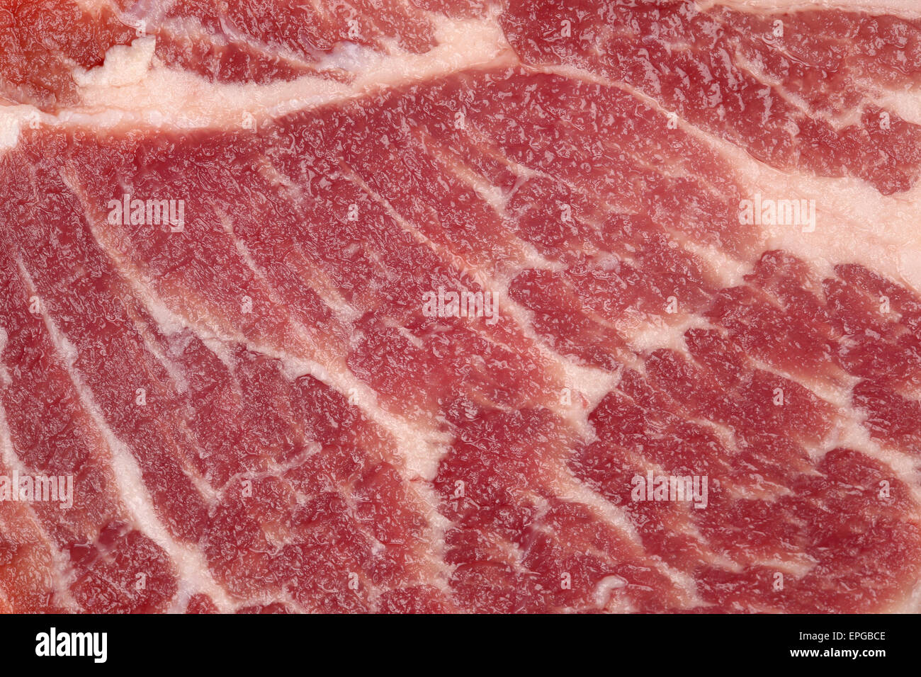 Rohes Schweinefleisch Kotelett Hintergrund Stockfoto