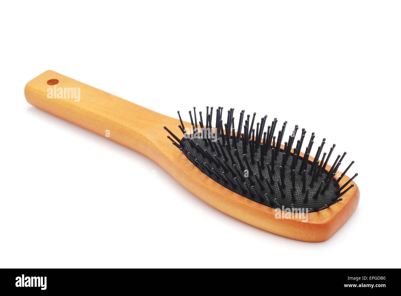 Haarbürste auf weißem Hintergrund Stockfoto