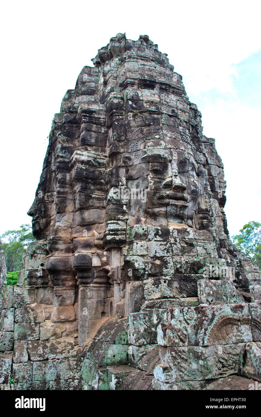 Geschnitzten Stein Kopf am Bayon, Angkor Thom, Angkor archäologischer Park, Kambodscha Stockfoto