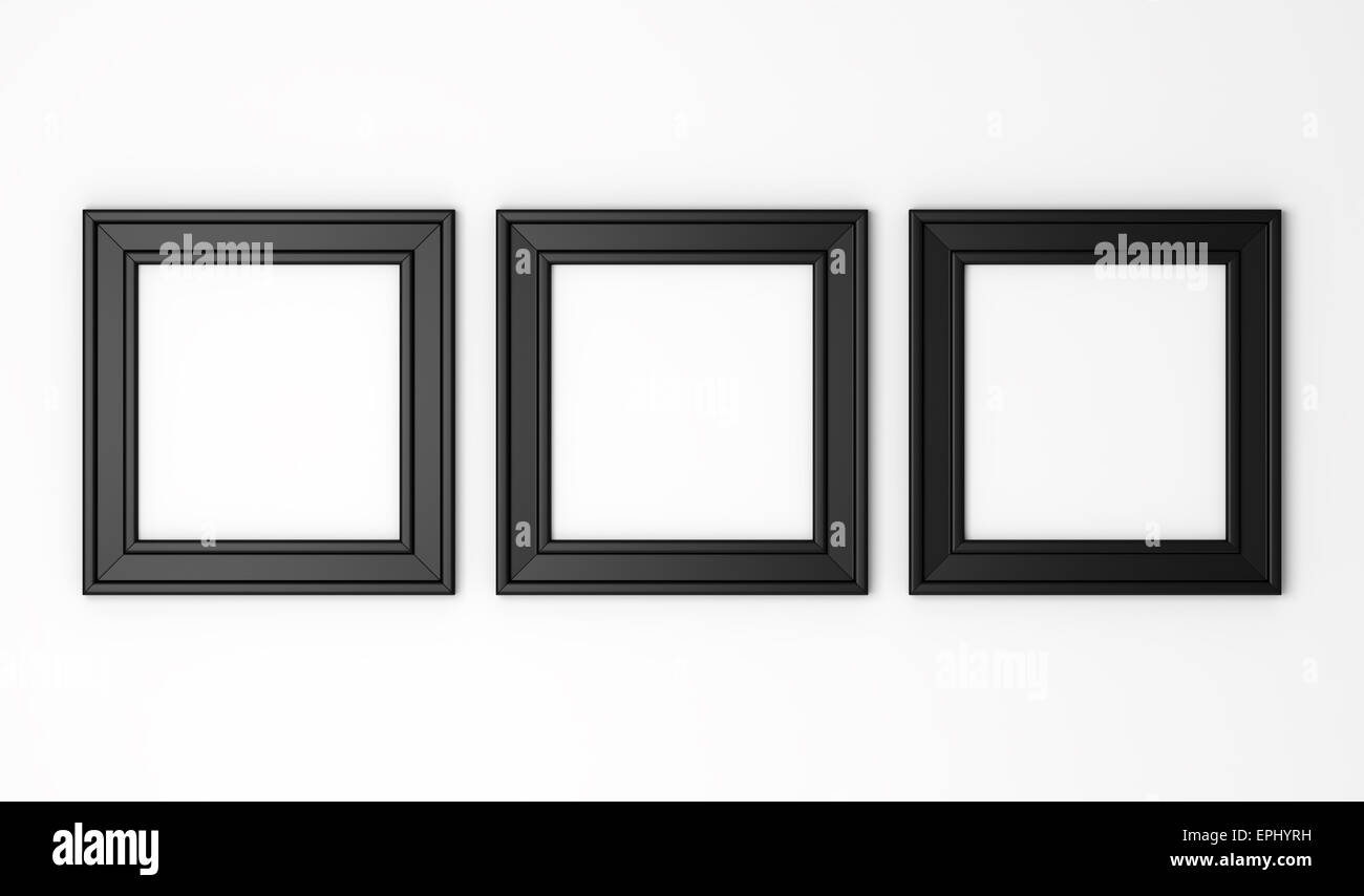 drei leere schwarze Fotorahmen auf weiße Wand Stockfoto