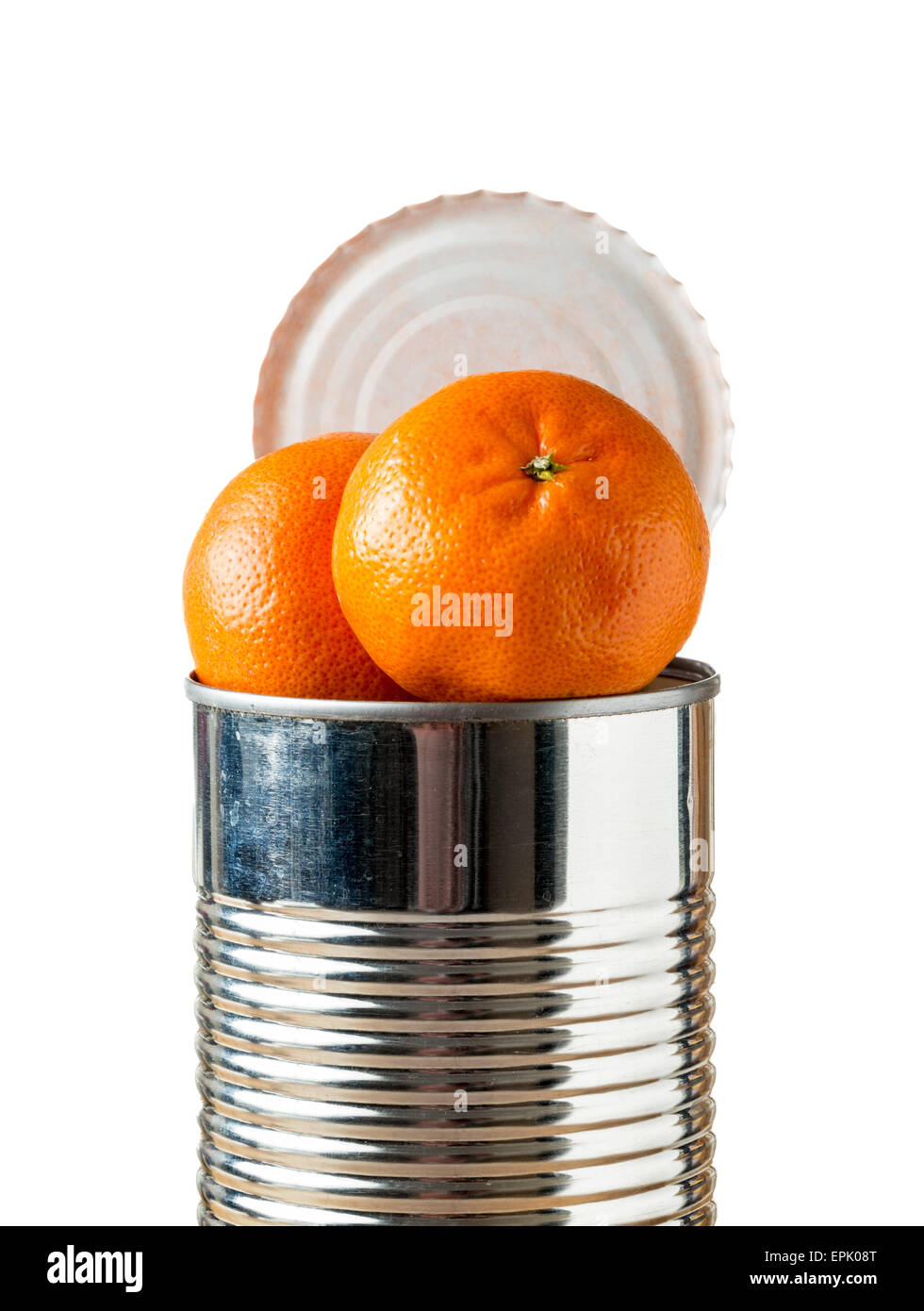 Orangen platzt aus Blechdose Stockfoto