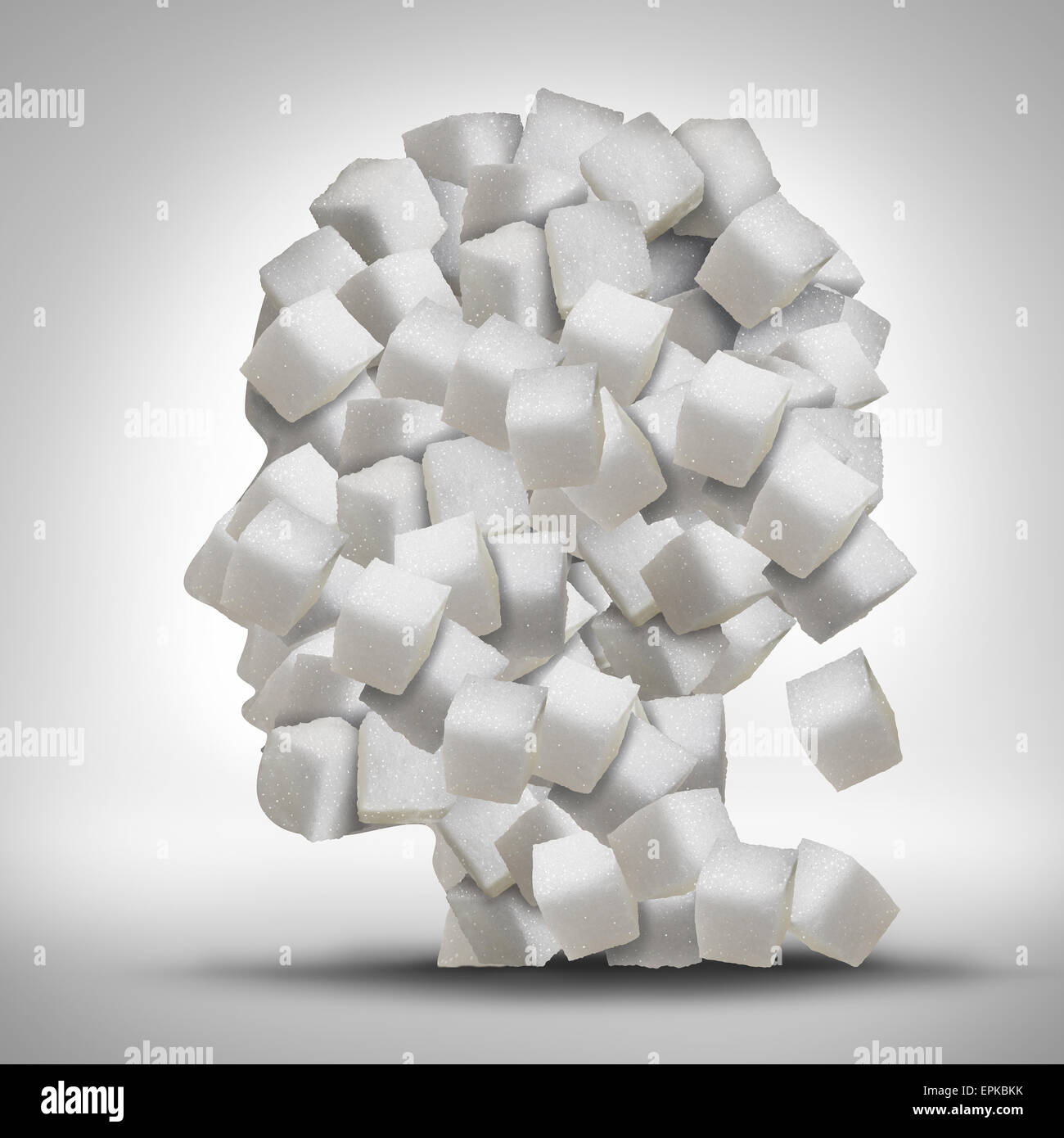Zucker-sucht-Konzept als ein menschlicher Kopf aus weißen granulierten raffinierten süße Würfel als ein Gesundheitswesen Symbol für süchtig Stockfoto