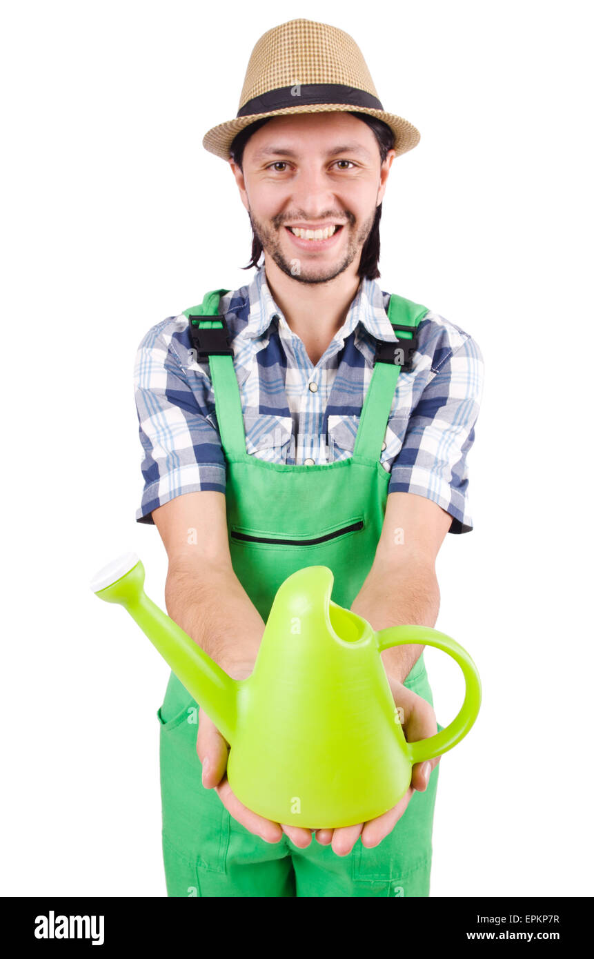 Junge fröhlich Gärtner mit Gießkanne isoliert auf weiss Stockfotografie