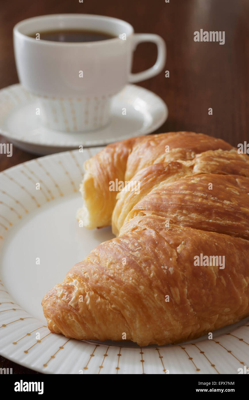Croissant und Kaffee Stockfoto