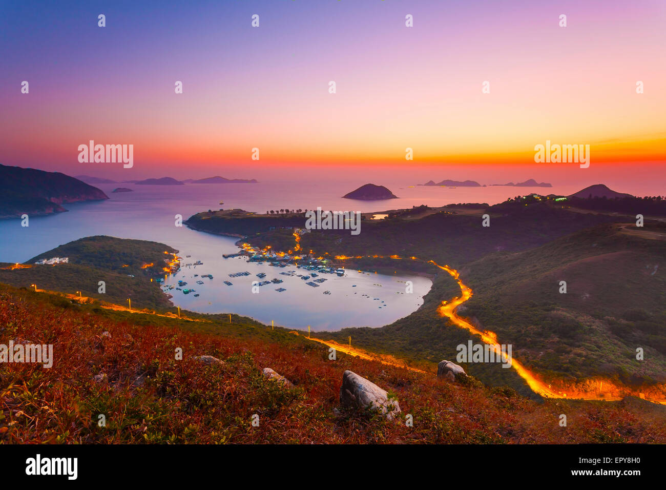 Sonnenaufgang am Golf in Hong Kong Stockfoto
