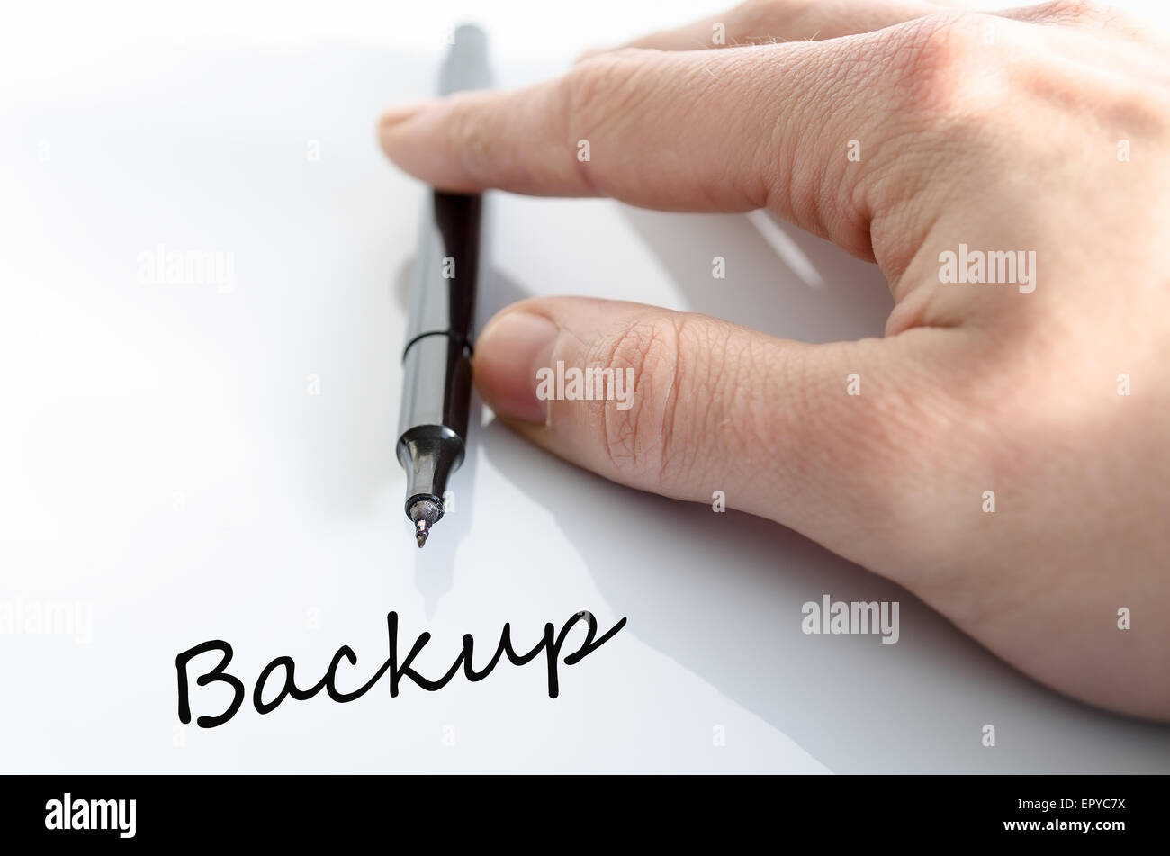 Stift in der Hand isoliert auf weißem Hintergrund Backup Konzept Stockfoto